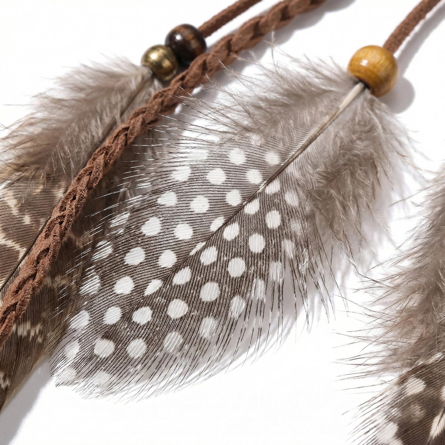 Handmade feather hair extension with rope details