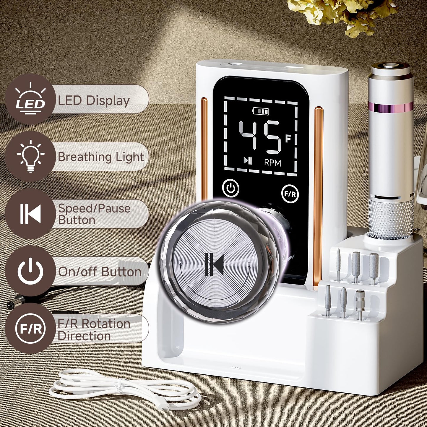 Close up of Puriom nail drill handpiece and digital display