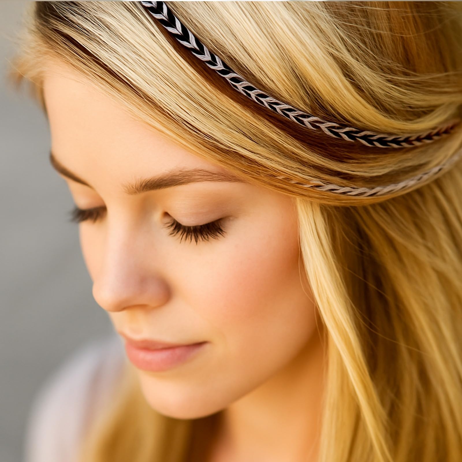 Styling demonstration of grizzly and ginger hair feathers