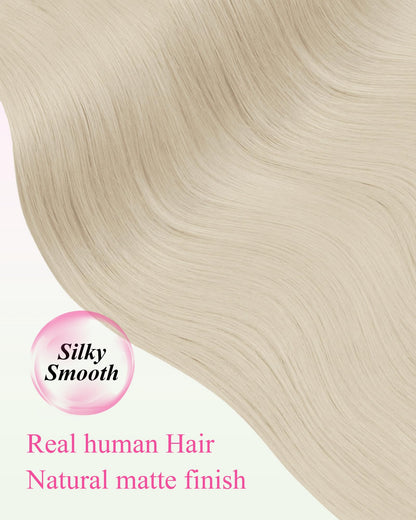 Twenty pieces of fifty grams straight platinum blonde human hair extensions spread out.