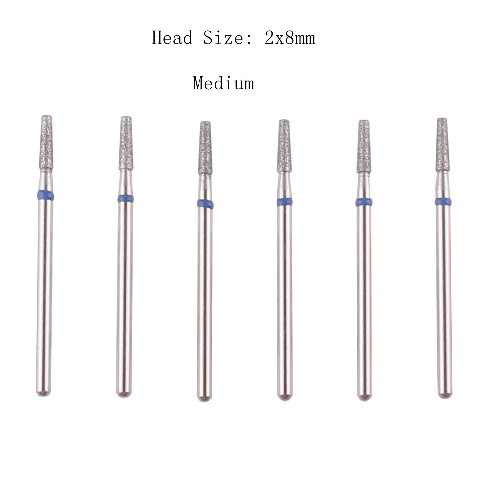 Close up of professional diamond nail drill bits showing fine and medium grits