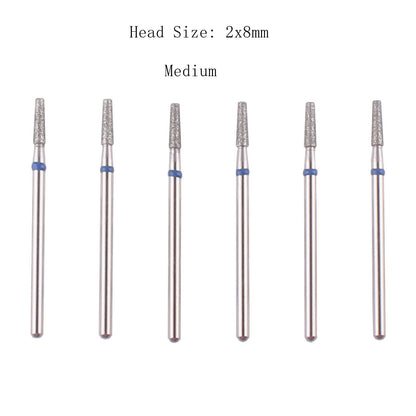 Close up of professional diamond nail drill bits showing fine and medium grits