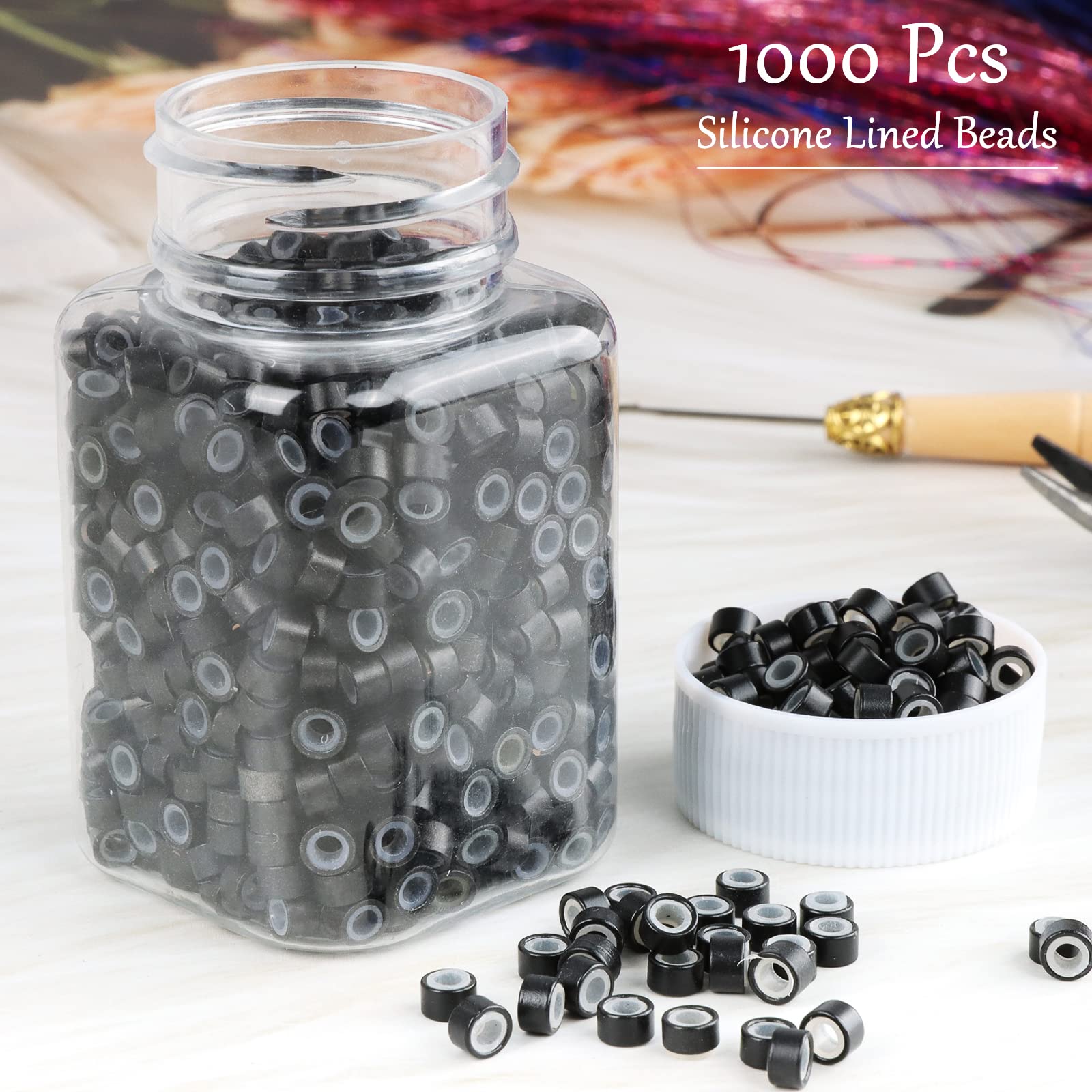 Close up view of five millimeter black hair extension beads showcasing the inner soft silicone lining layer
