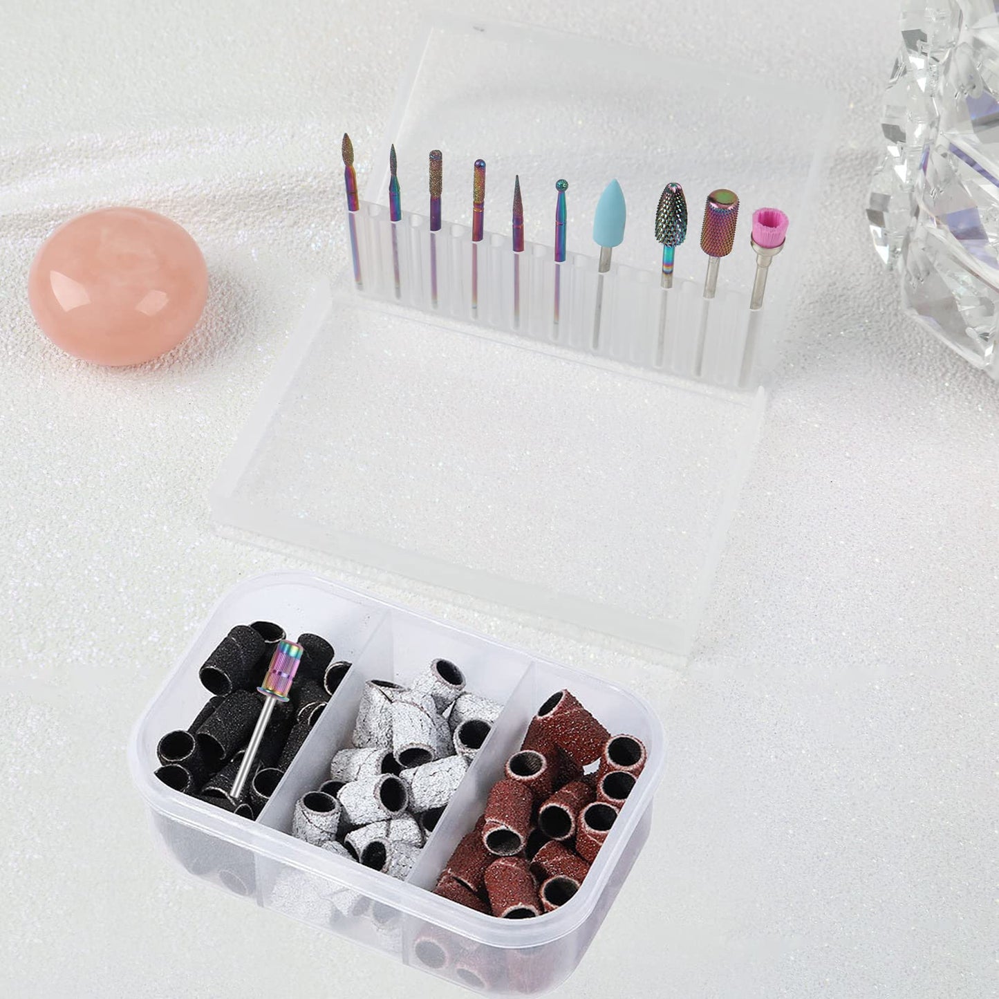 Full packaging of the BQAN ten piece professional manicure kit with its transparent travel compact organizer box and multi color sanders