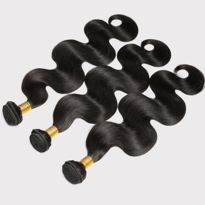 Textured shot of the natural black body wave pattern on unprocessed human hair bundles
