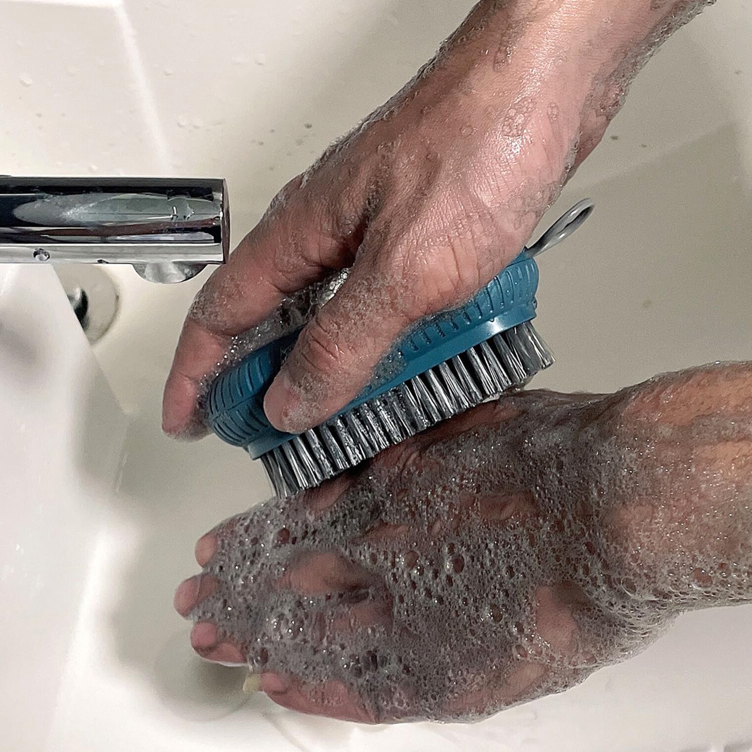 Sxmqhy mechanical nail brush side view detailing the robust ABS plastic handle construction and compact dimensions.