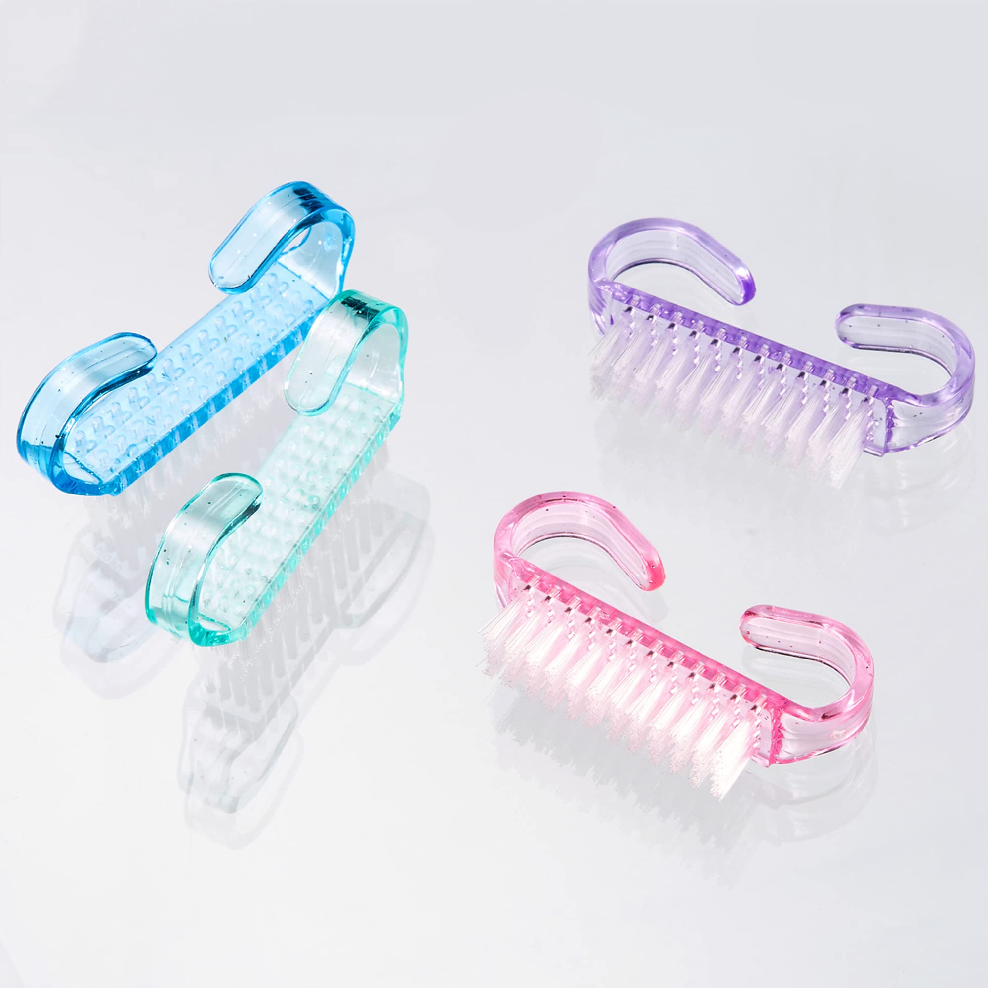 Four piece small multicolor hand cleaning brushes arranged neatly together