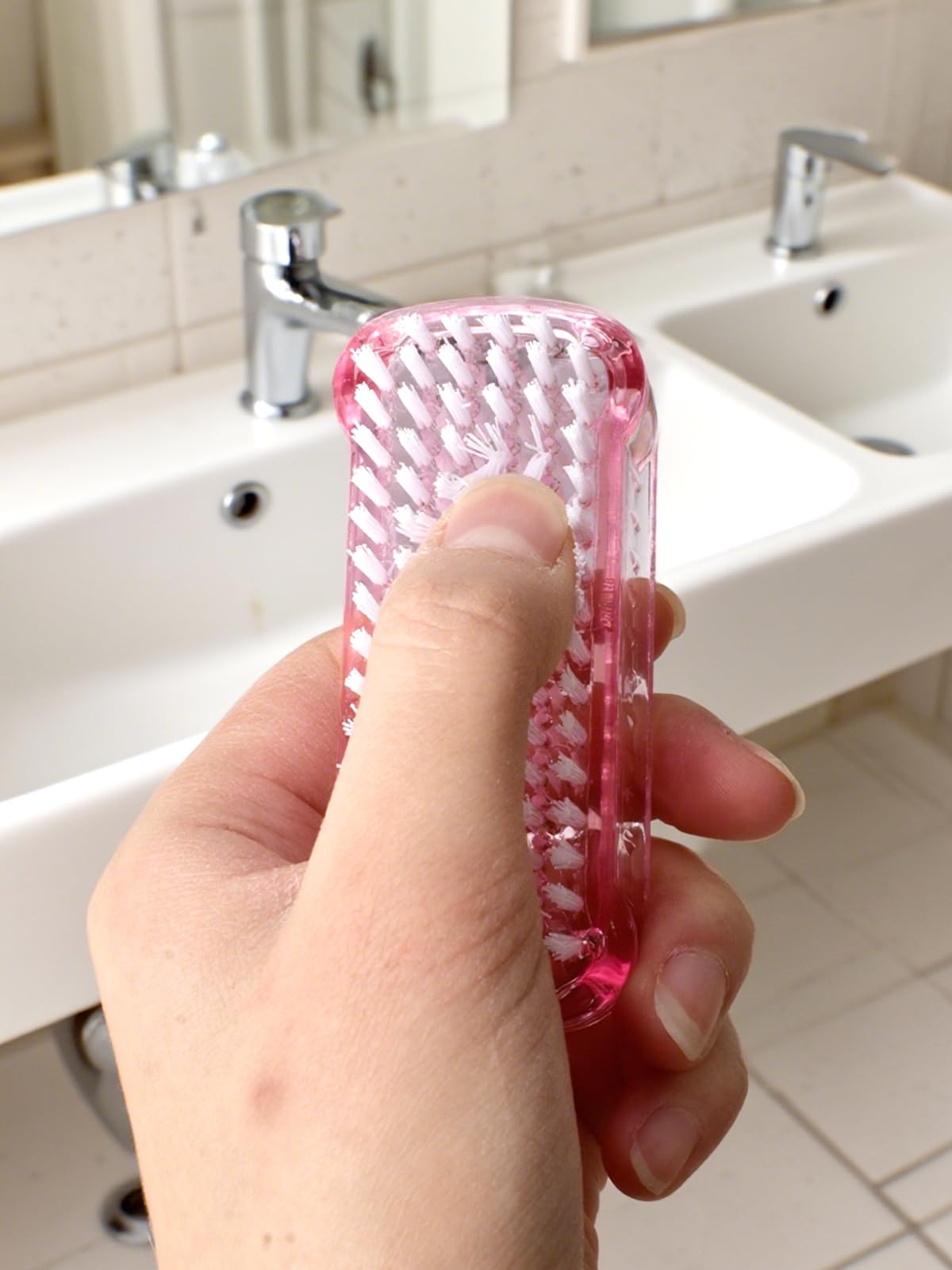 Ergonomic plastic handle grip on a premium hand cleaning scrub brush