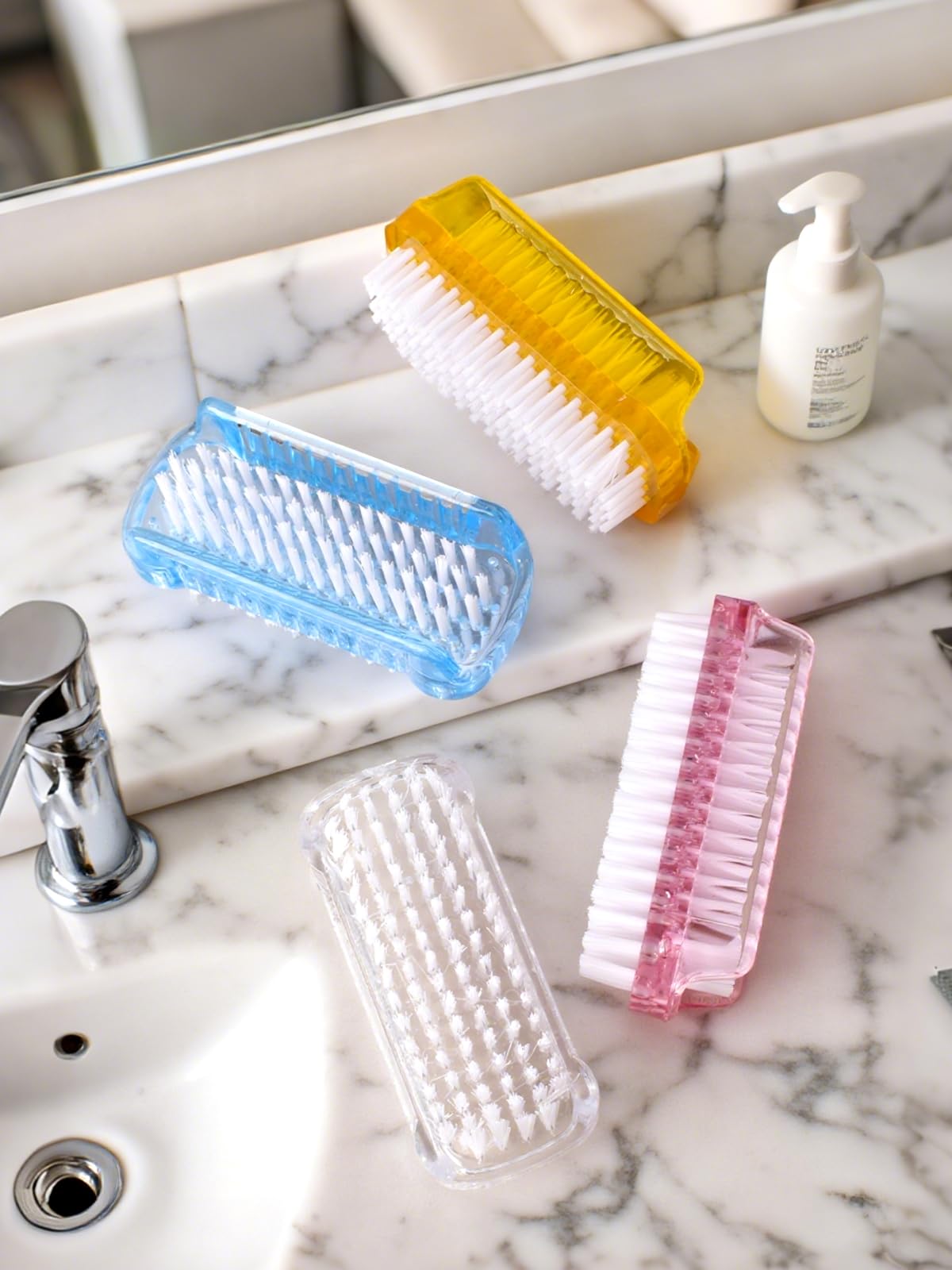 Multifunction scrubbing brush for women and men showing the underside cleaning bristles