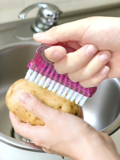 Set of four portable nail brushes arranged to display compact and lightweight travel size