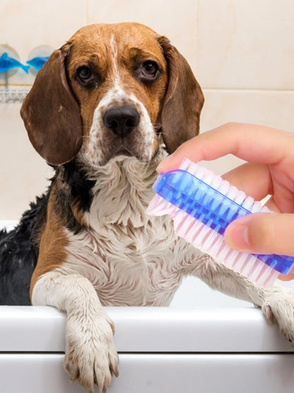 Durable dual sided hand and toe cleaning brush being used for personal hygiene