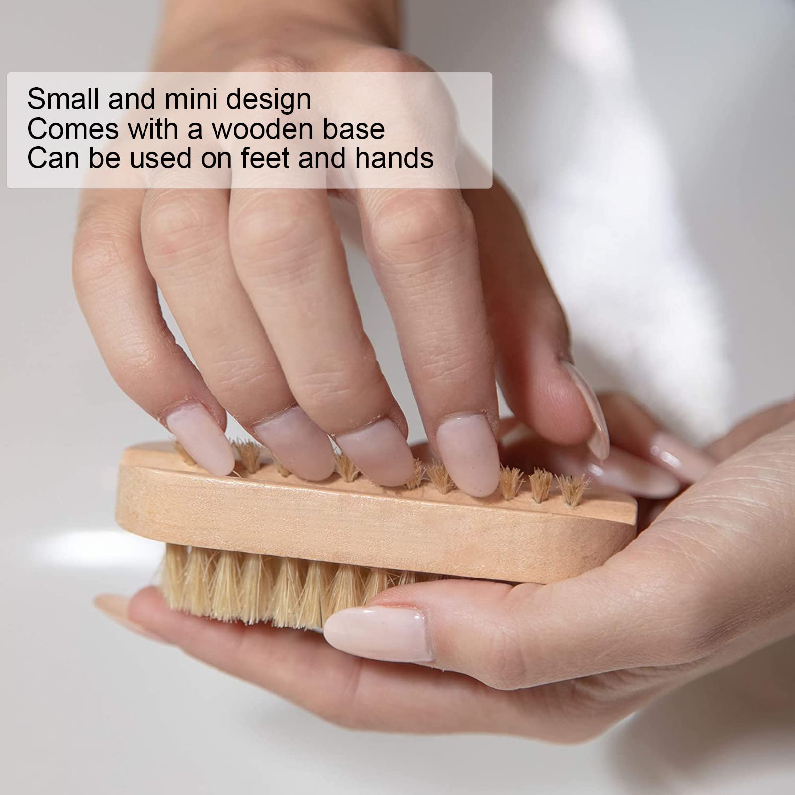 Top angle view of the eco-friendly pedicure grooming tool highlighting the secure setting of the nylon charcoal bristles.