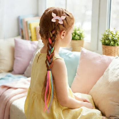 Six unique styles of Little World unicorn hair accessories for toddler ponytails.