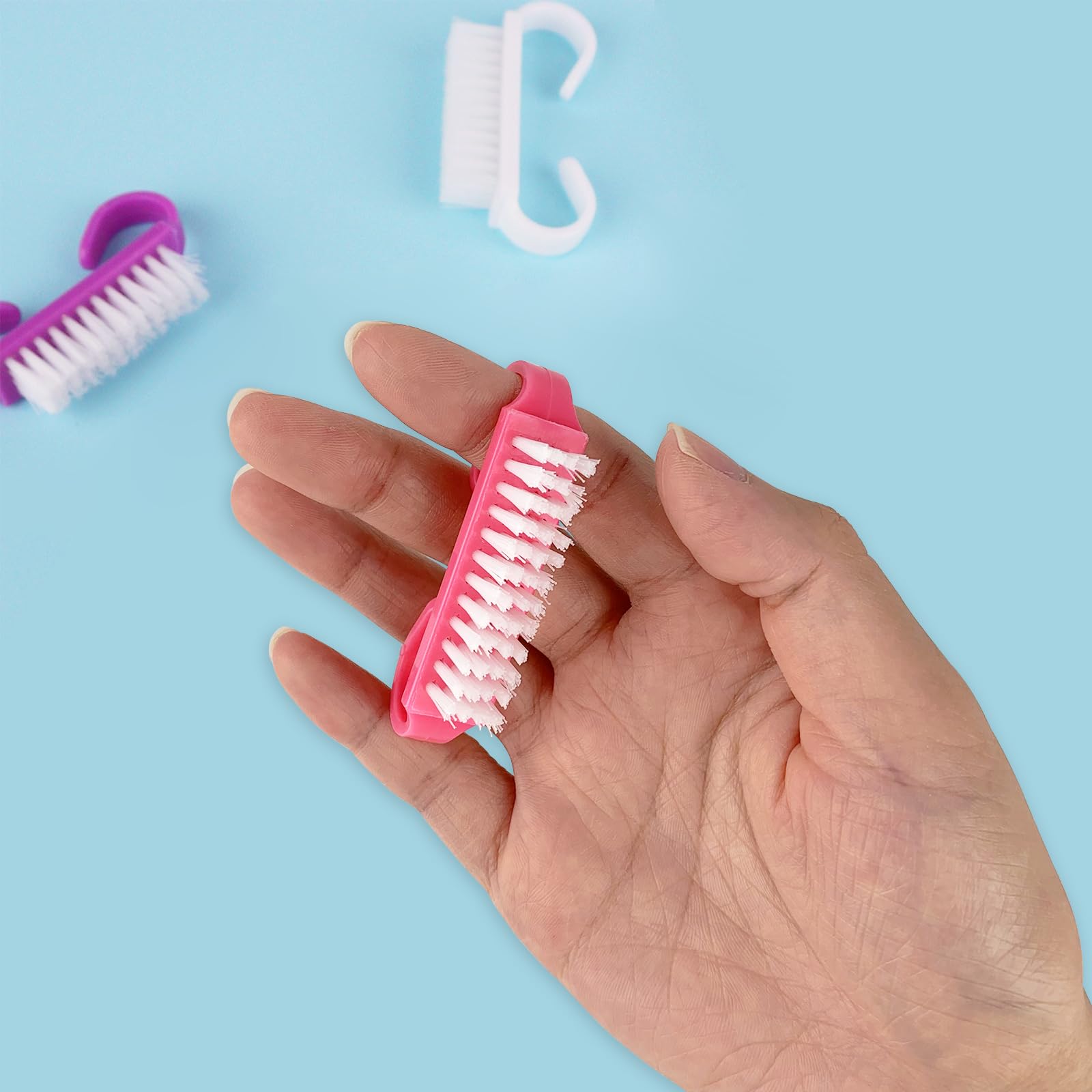 Four pack colorful nail brushes for travel use