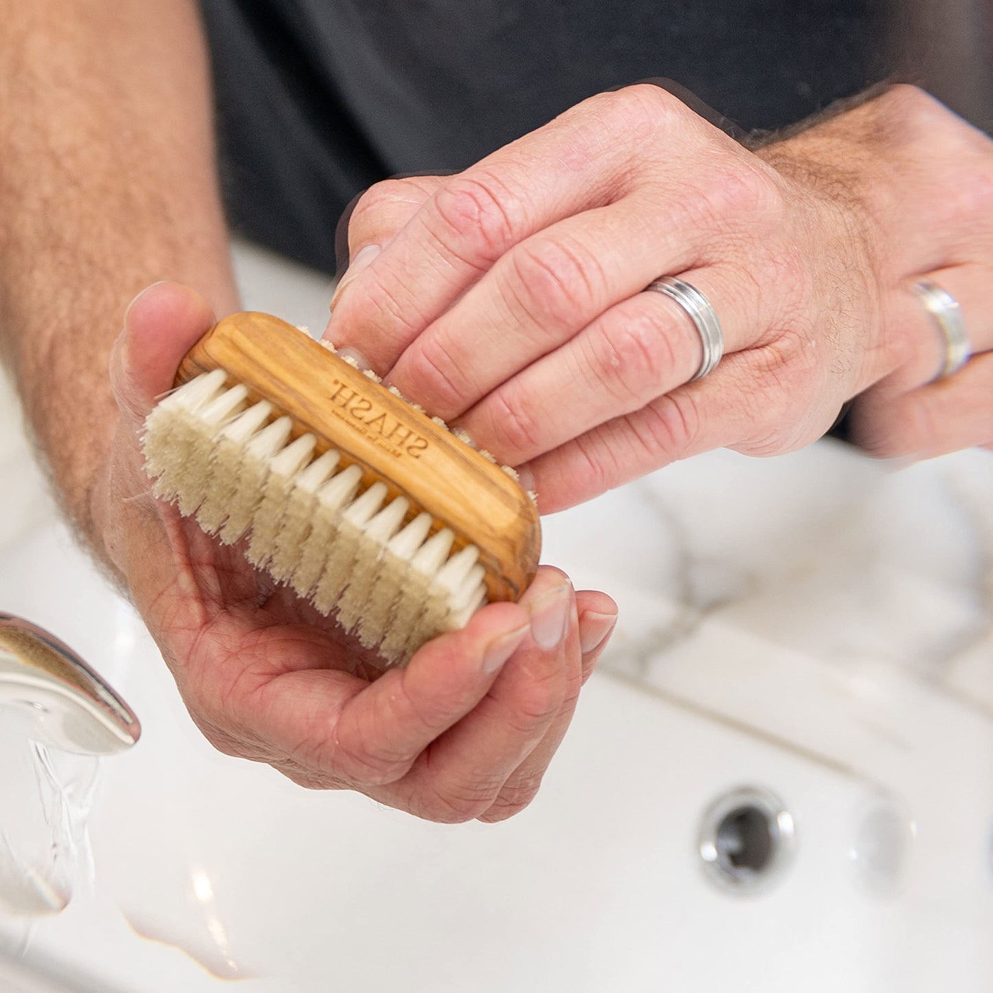 SHASH dual action fingernail and hand exfoliating brush showcasing dense natural fiber bristles