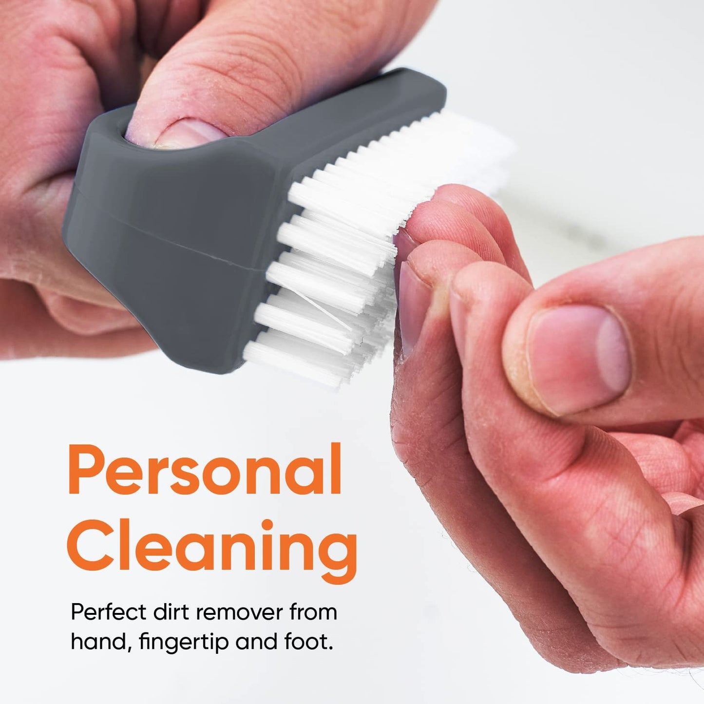 Superio multi functional toe and nail cleaning brush being held to demonstrate the secure grip