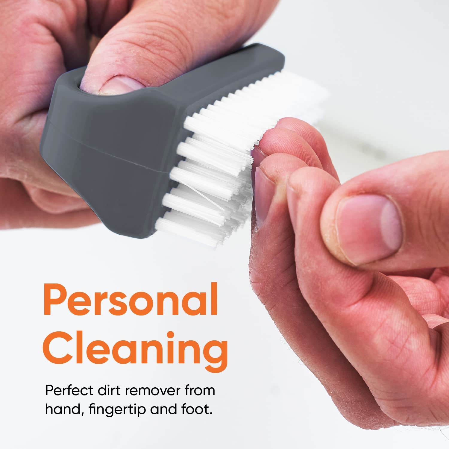 Superio multi functional toe and nail cleaning brush being held to demonstrate the secure grip