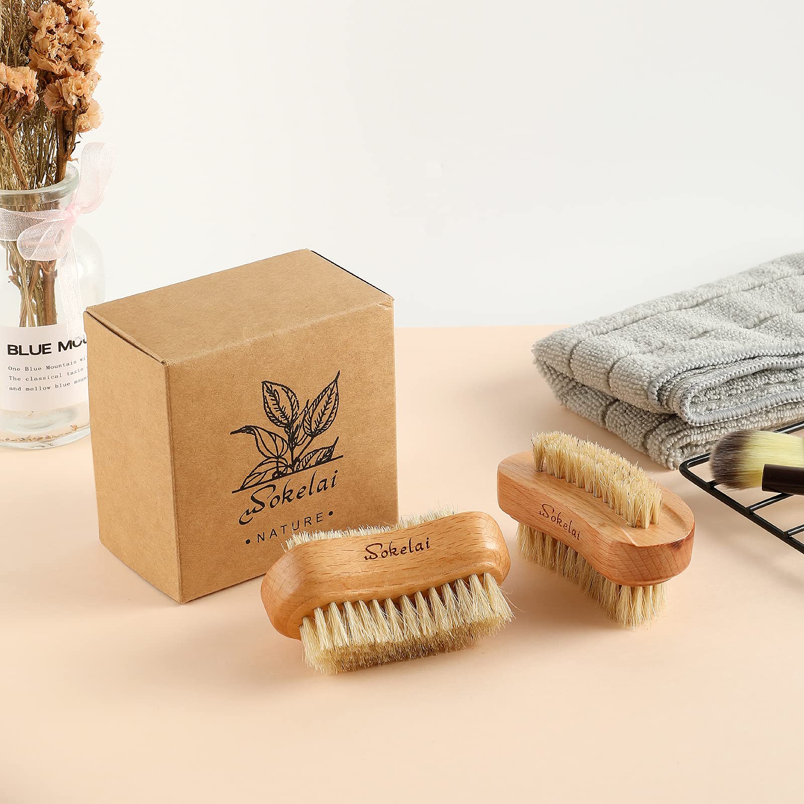 Authentic packaging of the two pack wooden hand washing and nail cleaning tool.