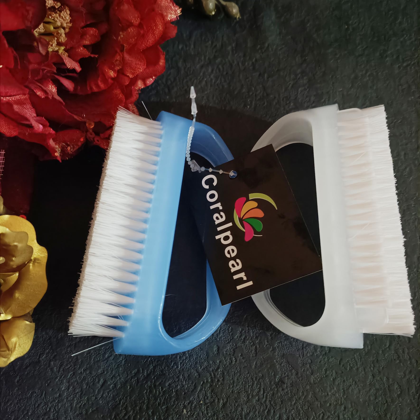 Ergonomic handle grip on manual plastic scrubbing tools for easy holding and maneuvering