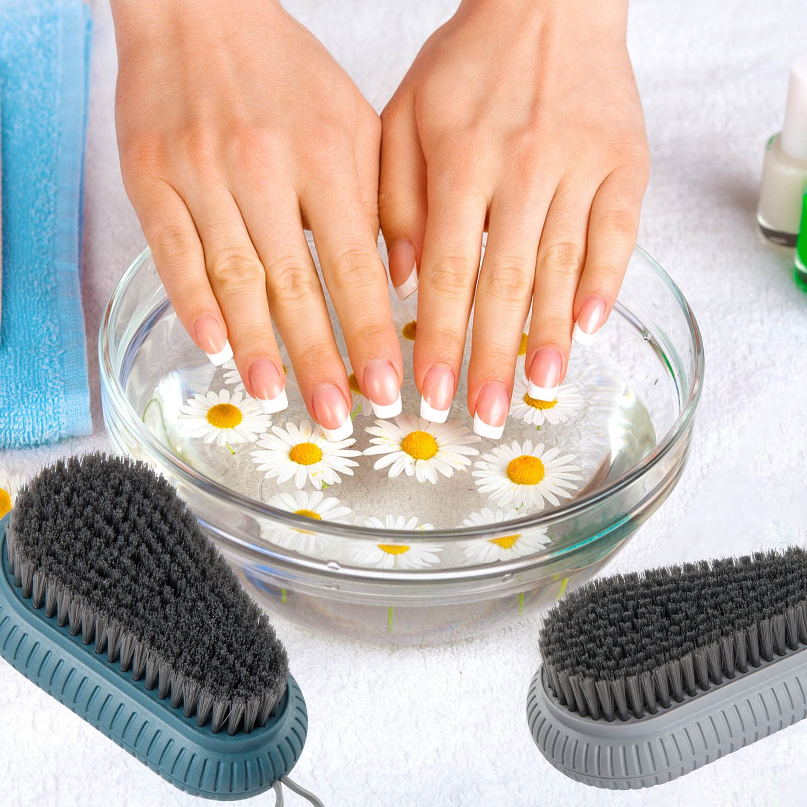 Handheld view of Canipha nail cleaning brush showing grip