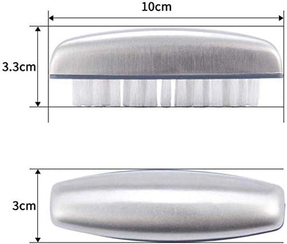 Sleek silver metal soap and nail cleaning brush setup next to a modern sink