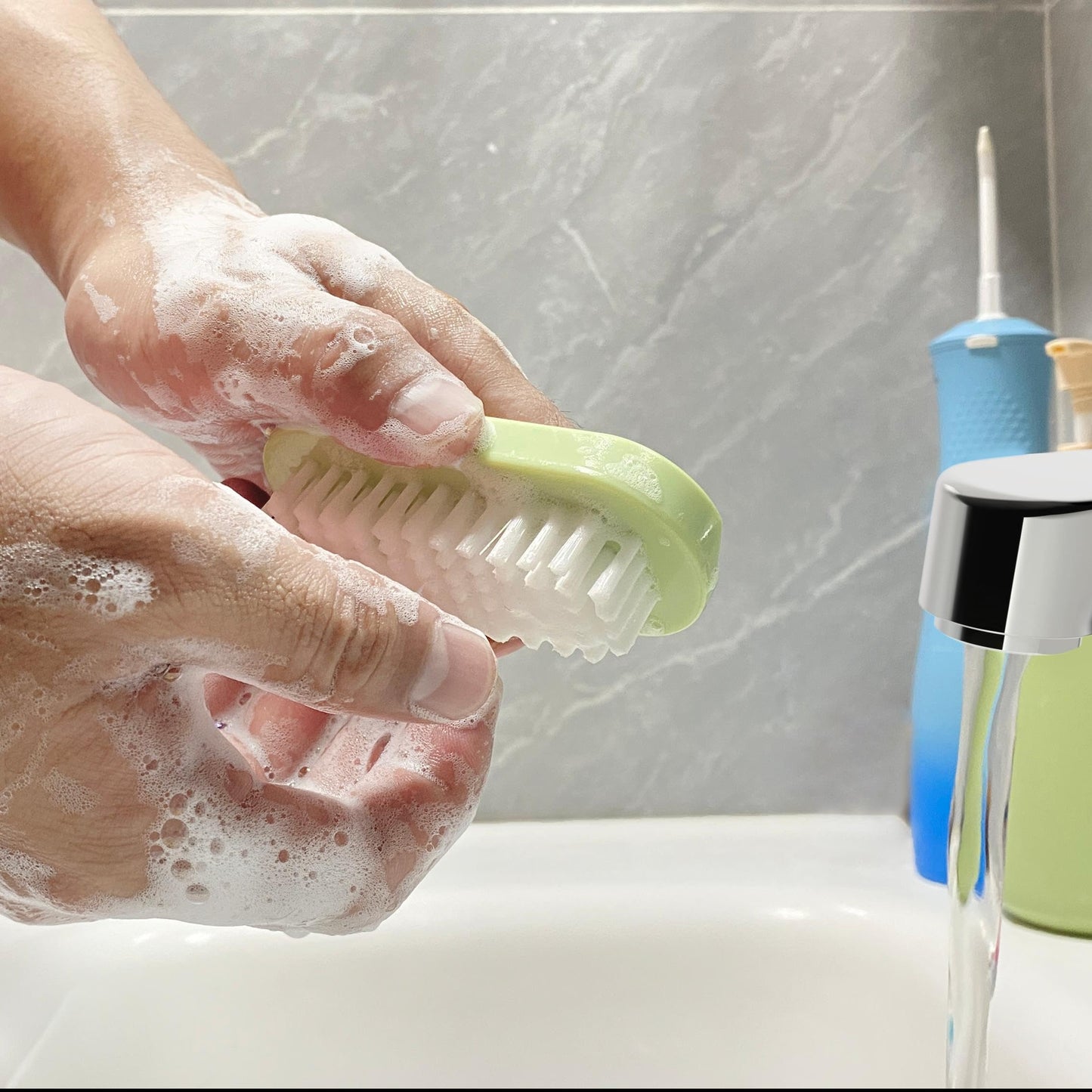 Bathroom setting with OYEWALLS nail brushes for hygiene