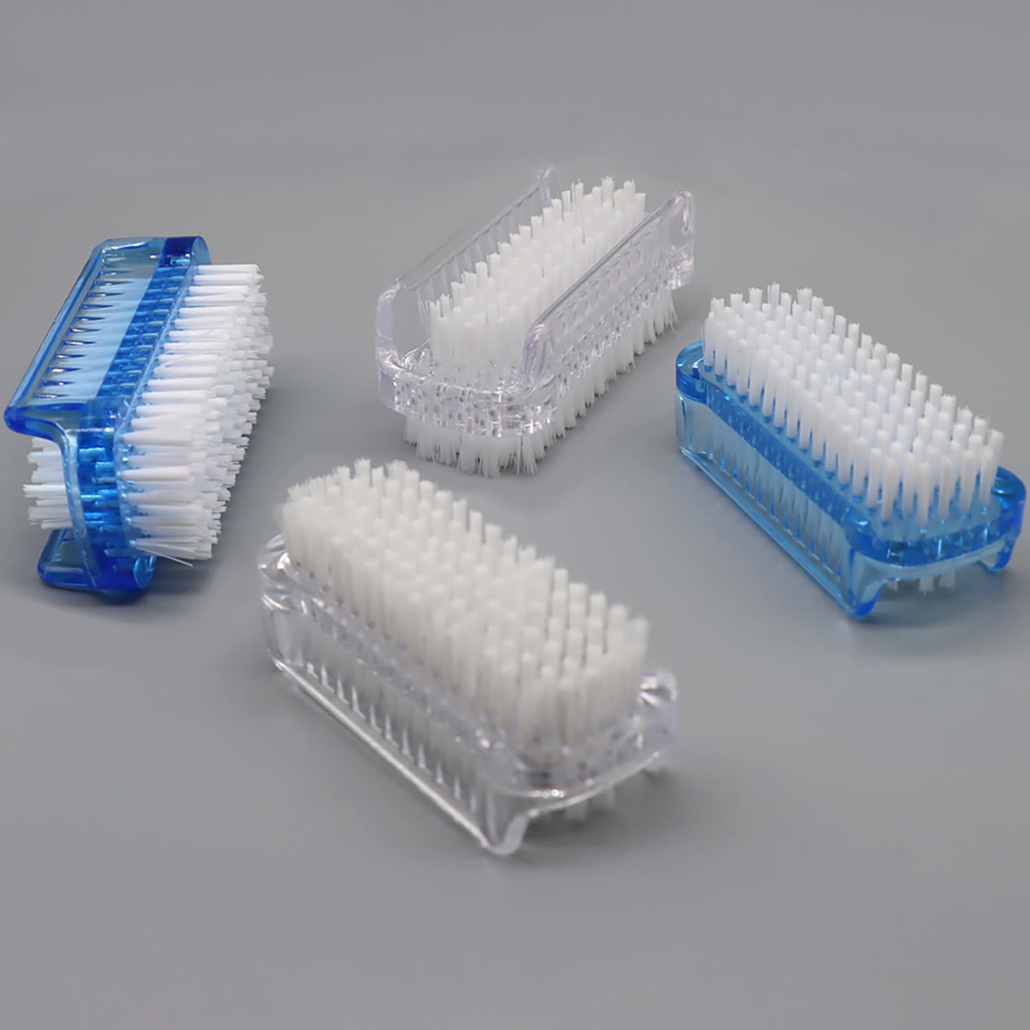 Four pieces pack of imported double sided hand and toe cleaning brushes.
