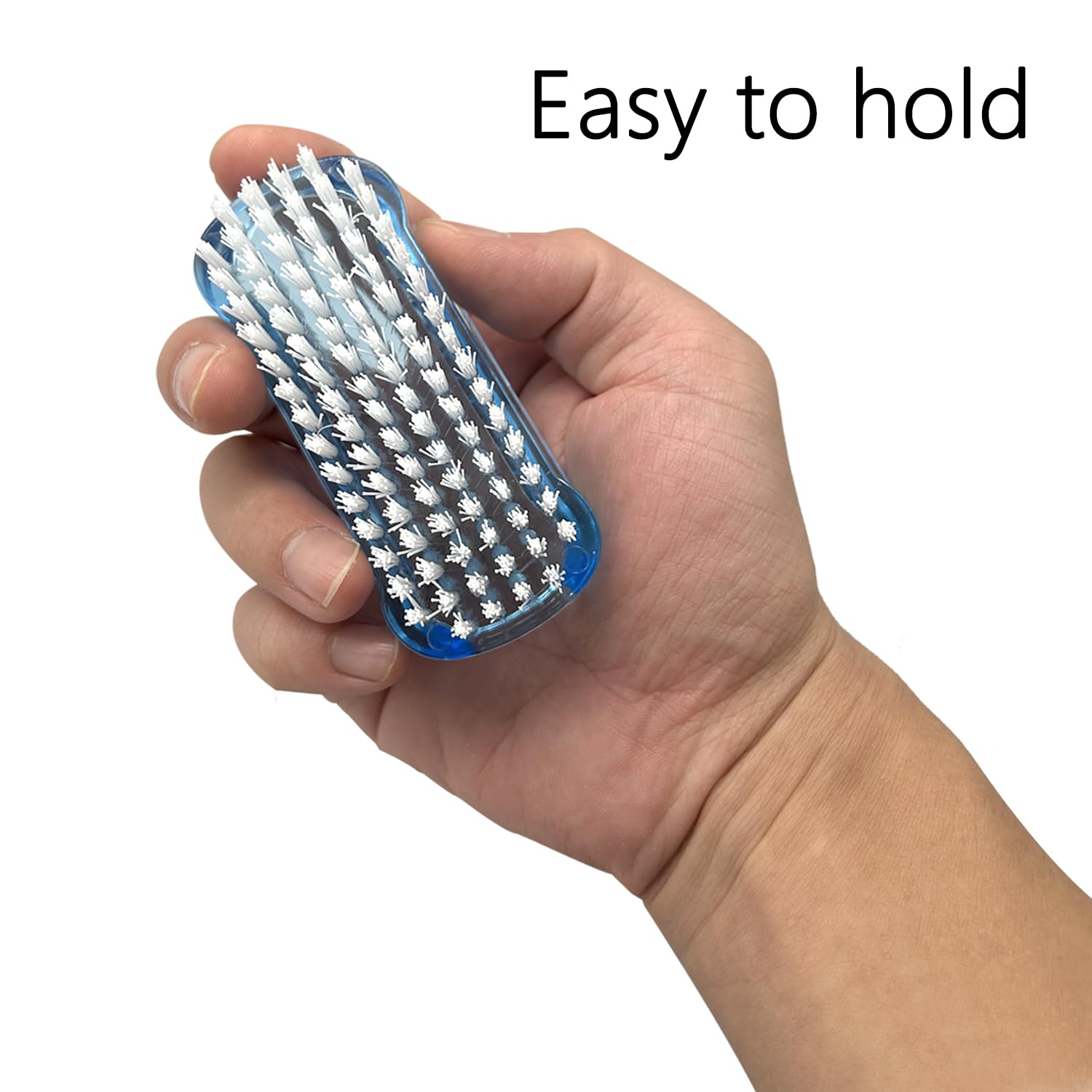Stiff bristles side of the premium fingernail brush removing dirt from cuticles.
