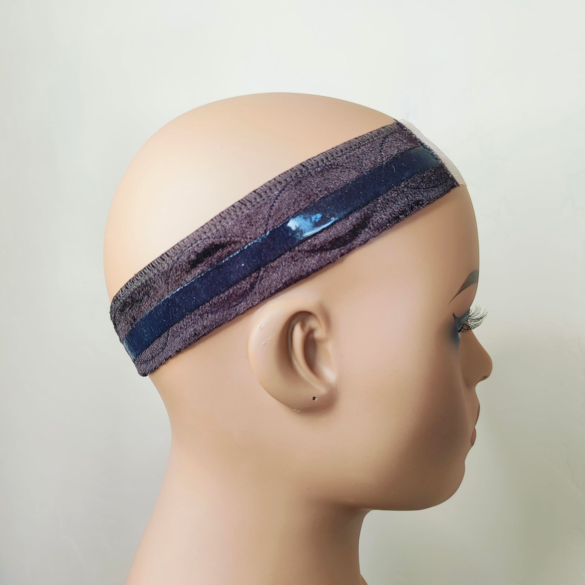 Close up of Swiss lace material on wig gripper band