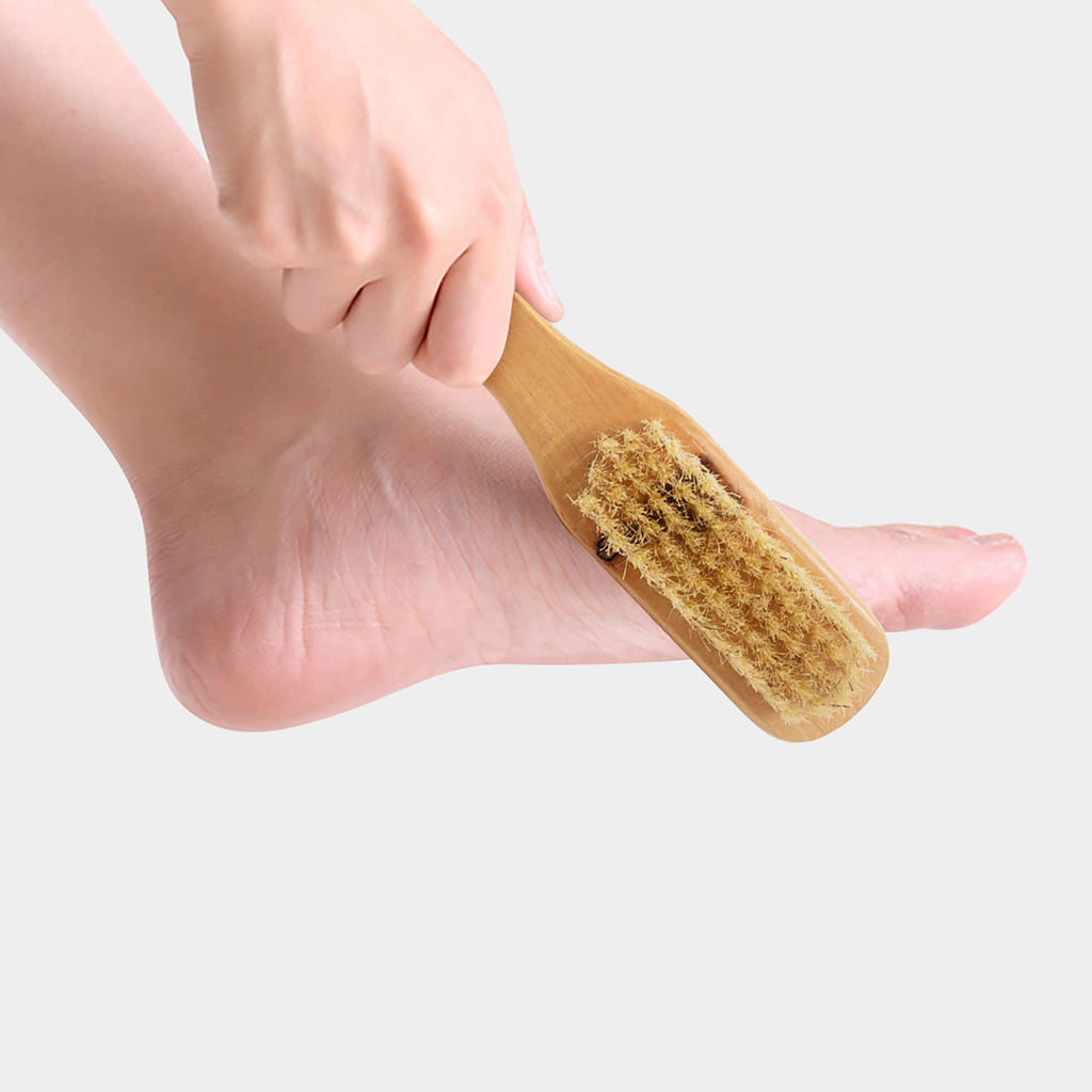 Aisilk foot scrubber hanging by its cotton rope