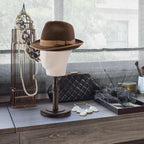 Mannequin head displaying a hat for retail store setup