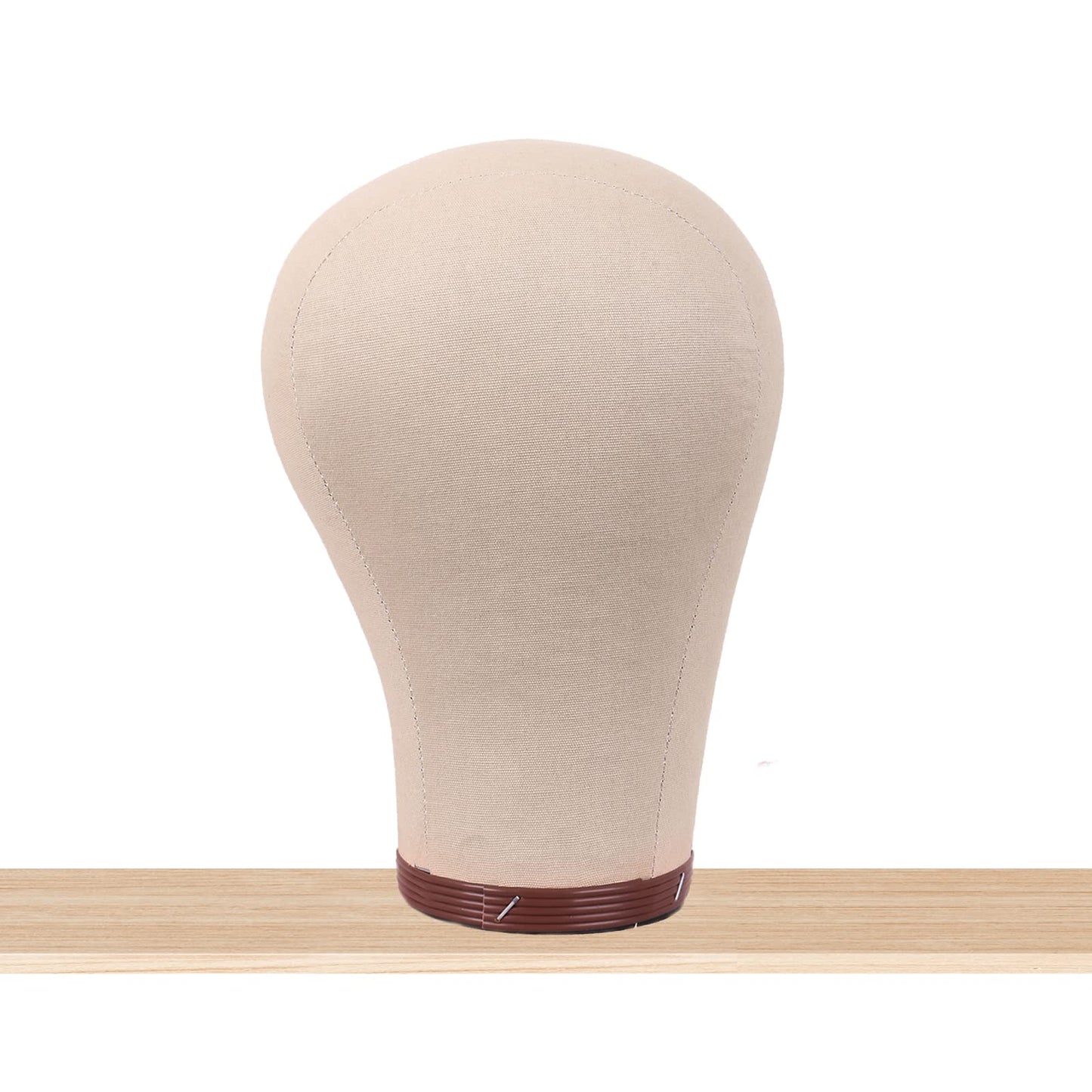 Side angle of the brown MapofBeauty 23 inch wig mannequin showing human head shape contours