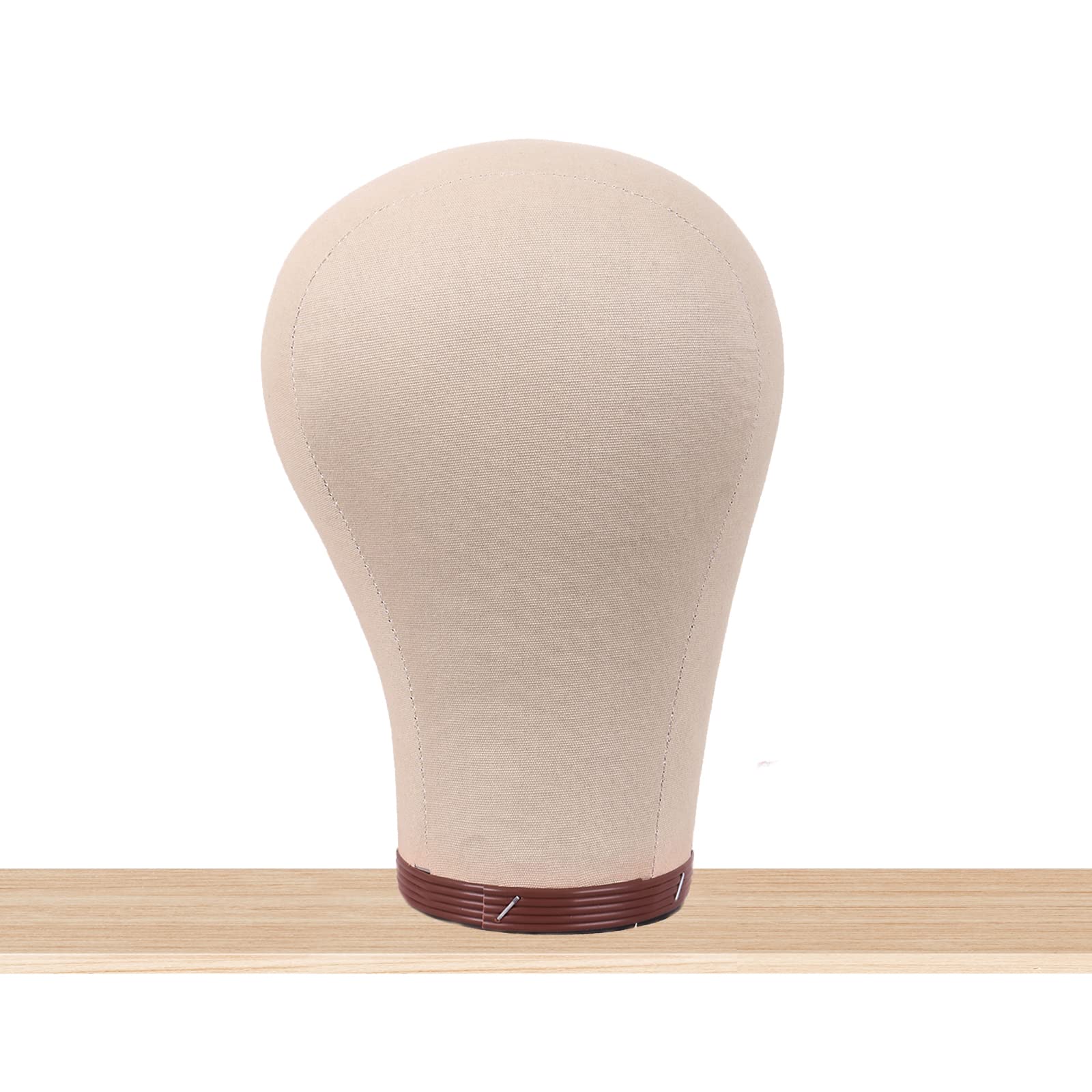 Side angle of the brown MapofBeauty 23 inch wig mannequin showing human head shape contours