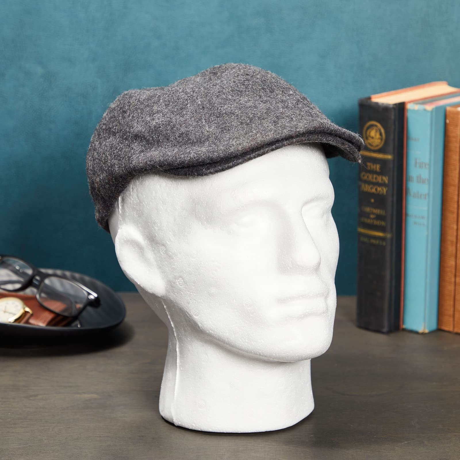White styrofoam male mannequin head for hat display side profile
