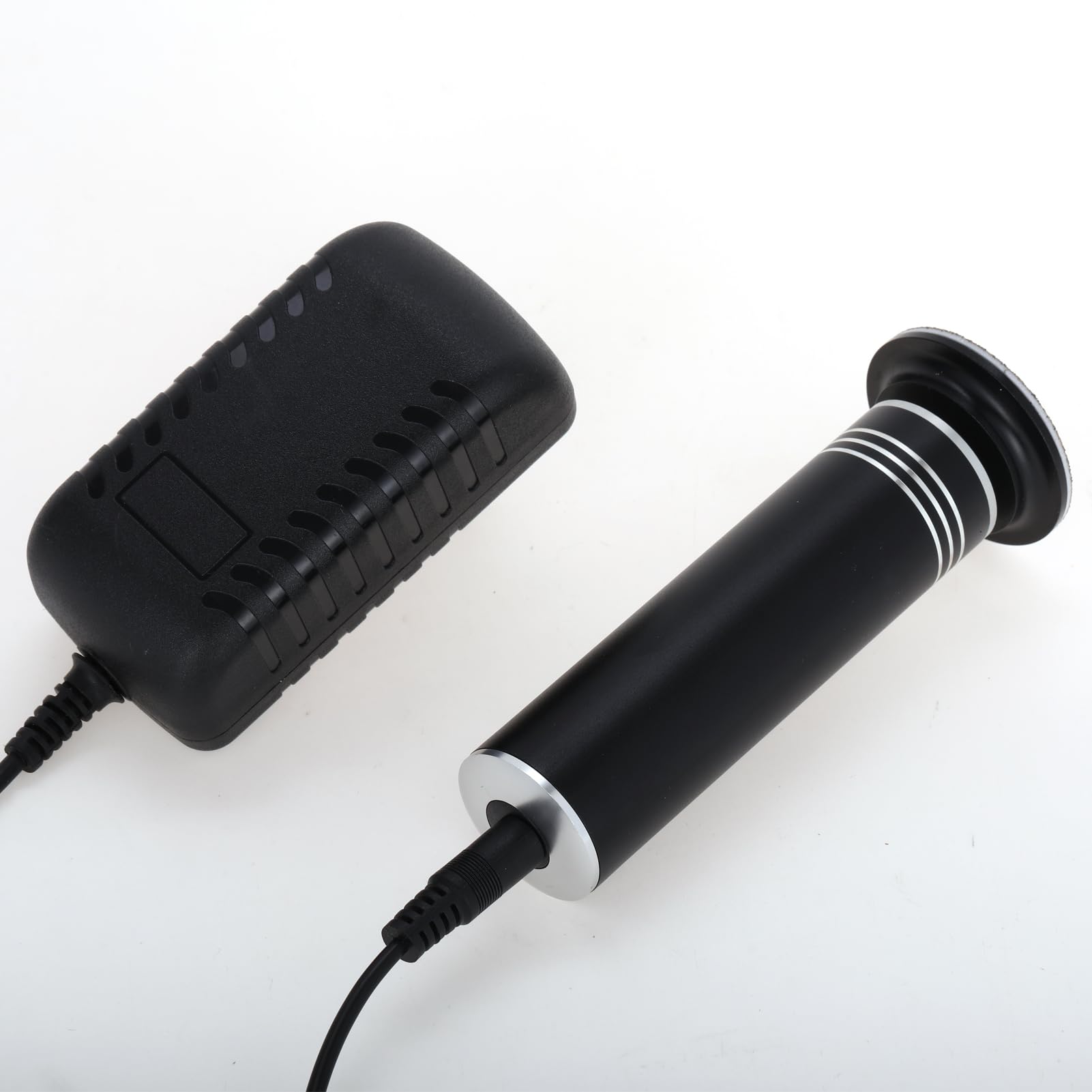 Hand holding the ergonomic electric callus remover