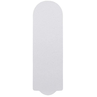 Close up view of the 180 grit white pedicure refill pads highlighting the textured abrasive surface.