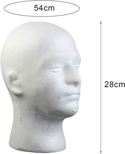 Male mannequin head model on a professional salon counter