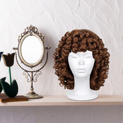 Three Leeven foam mannequin heads arranged together
