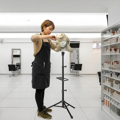Premium alloy steel wig tripod setup inside a professional salon environment