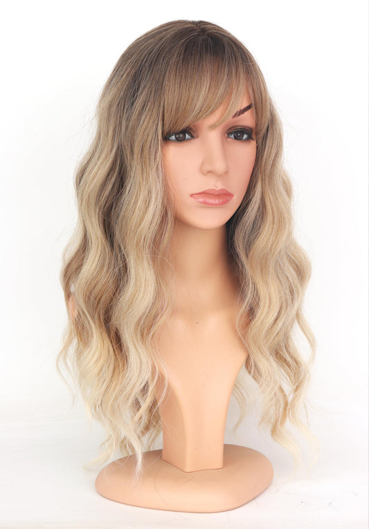 Medium long ash blonde synthetic wig with dark roots displayed on a mannequin head