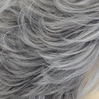 On-model showcase of the realistic looking grey ombre short hairstyle wig with bangs