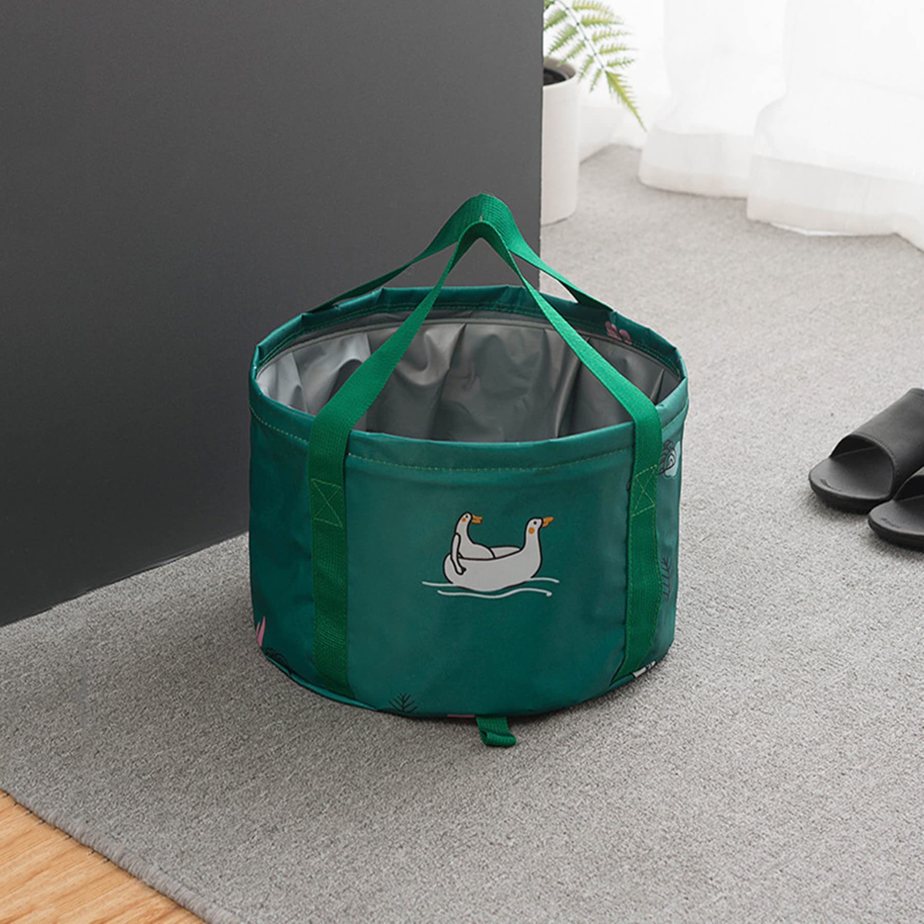 Collapsible travel foot spa bucket showing depth