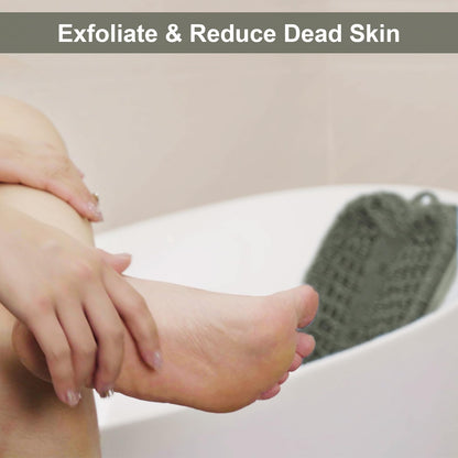 Person using Beskar foot scrubber in shower