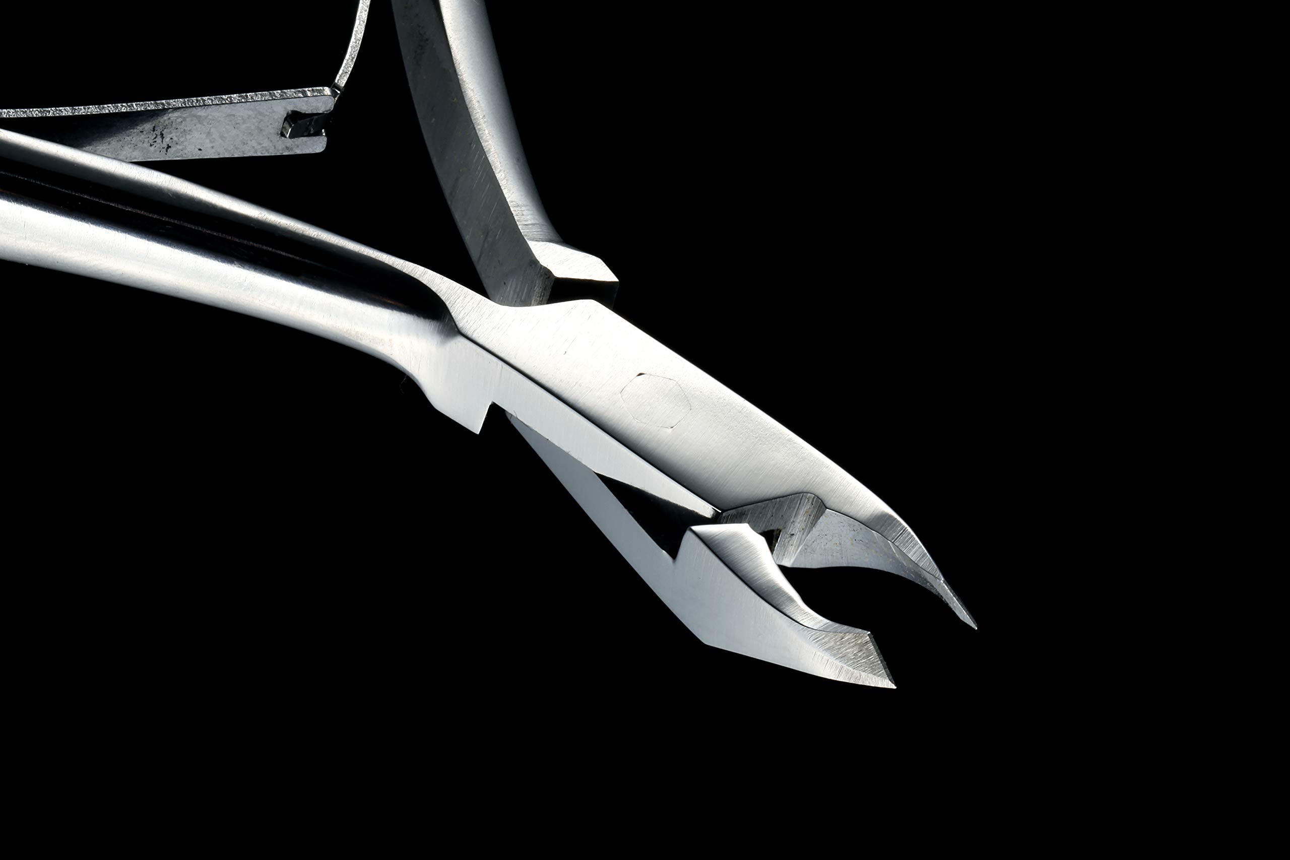 Handcrafted Japanese stainless steel cuticle nipper held in hand