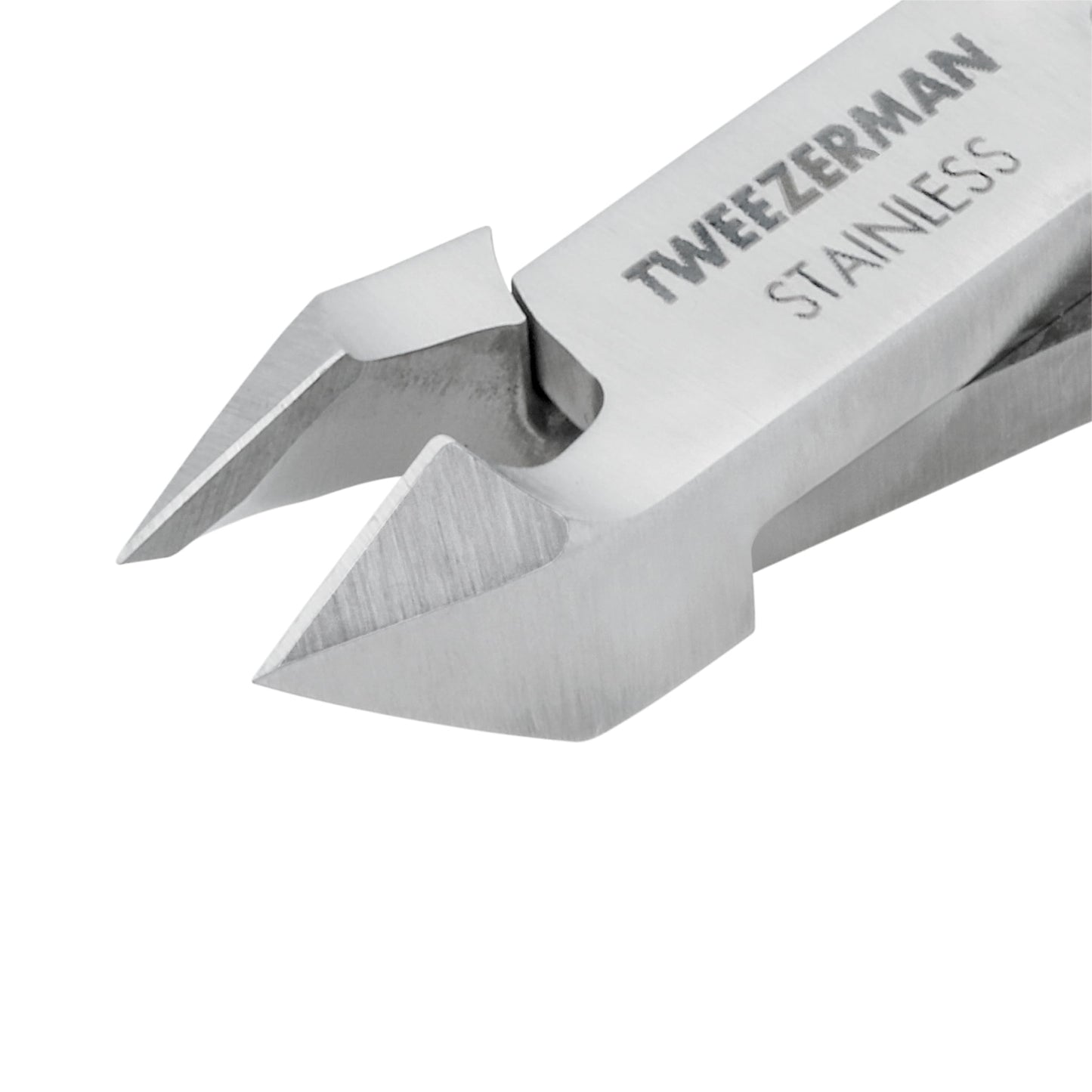 Close up view of Tweezerman professional nail grooming tool emphasizing the hand-filed half inch jaw blades