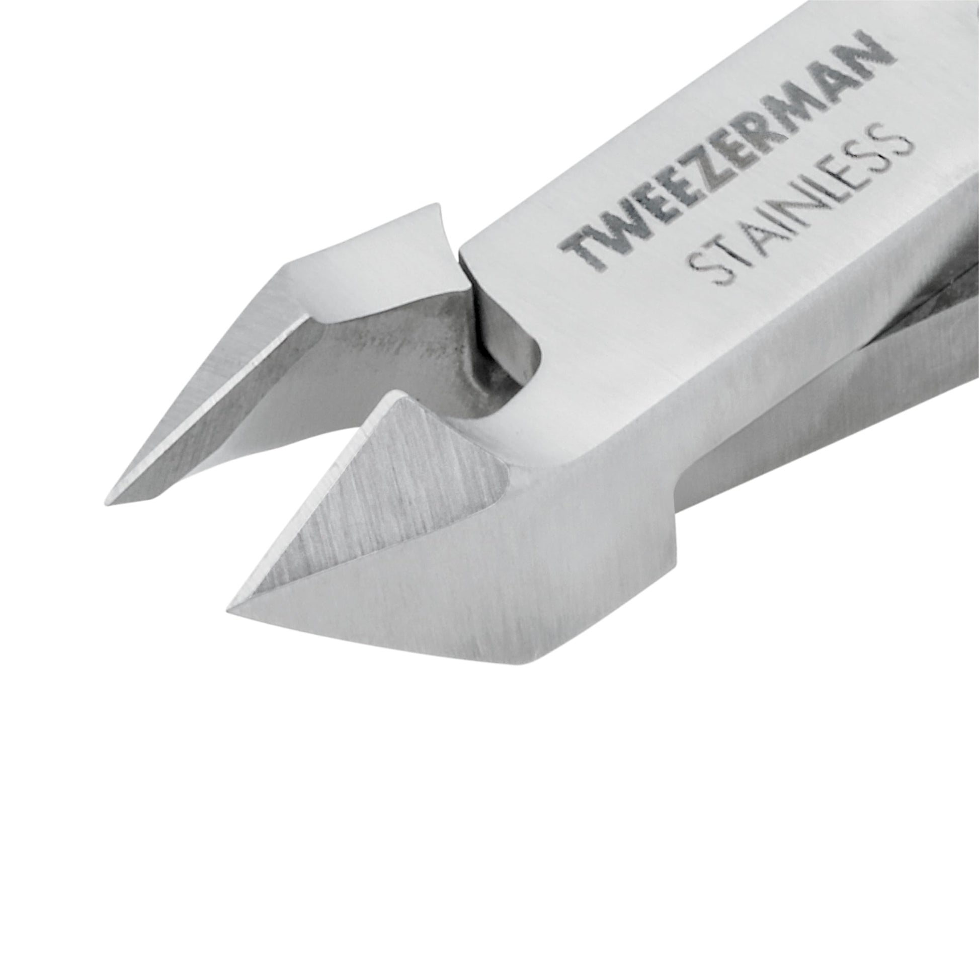 Close up view of Tweezerman professional nail grooming tool emphasizing the hand-filed half inch jaw blades
