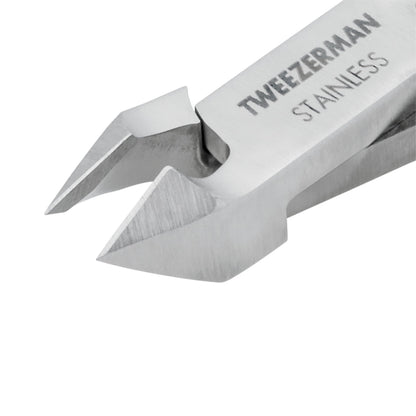 Close up view of Tweezerman professional nail grooming tool emphasizing the hand-filed half inch jaw blades