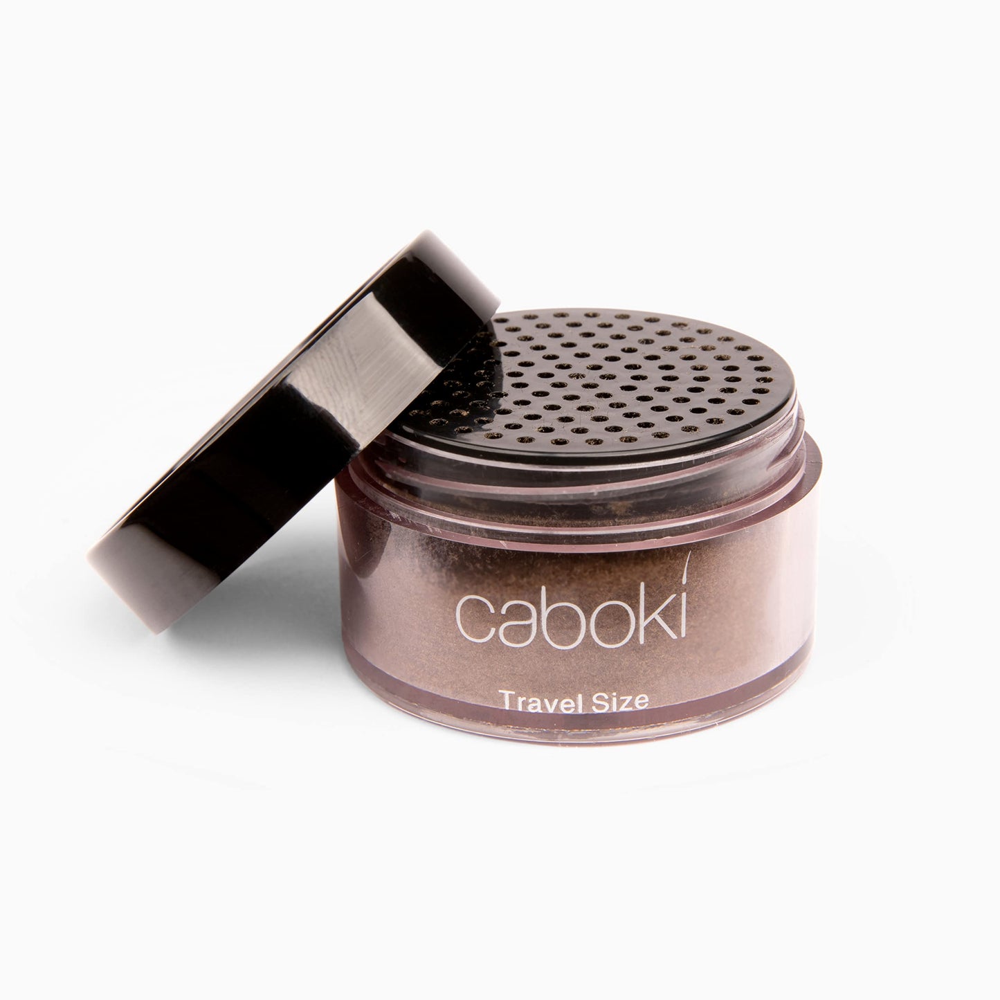 Caboki natural hair building fibers close up on container top dispenser