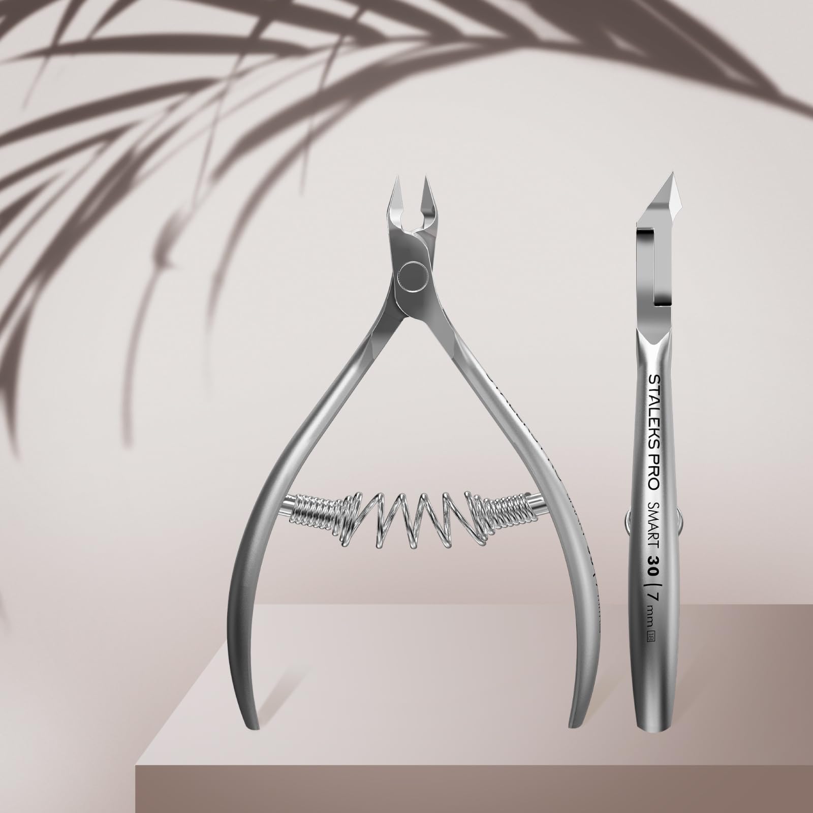 Staleks NS-30-7 cuticle nippers showing the coil spring mechanism