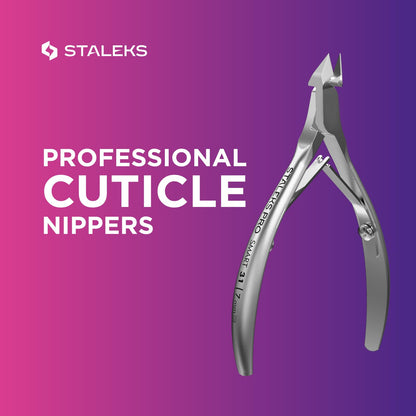 Staleks Pro Smart 31 nippers held in hand for scale